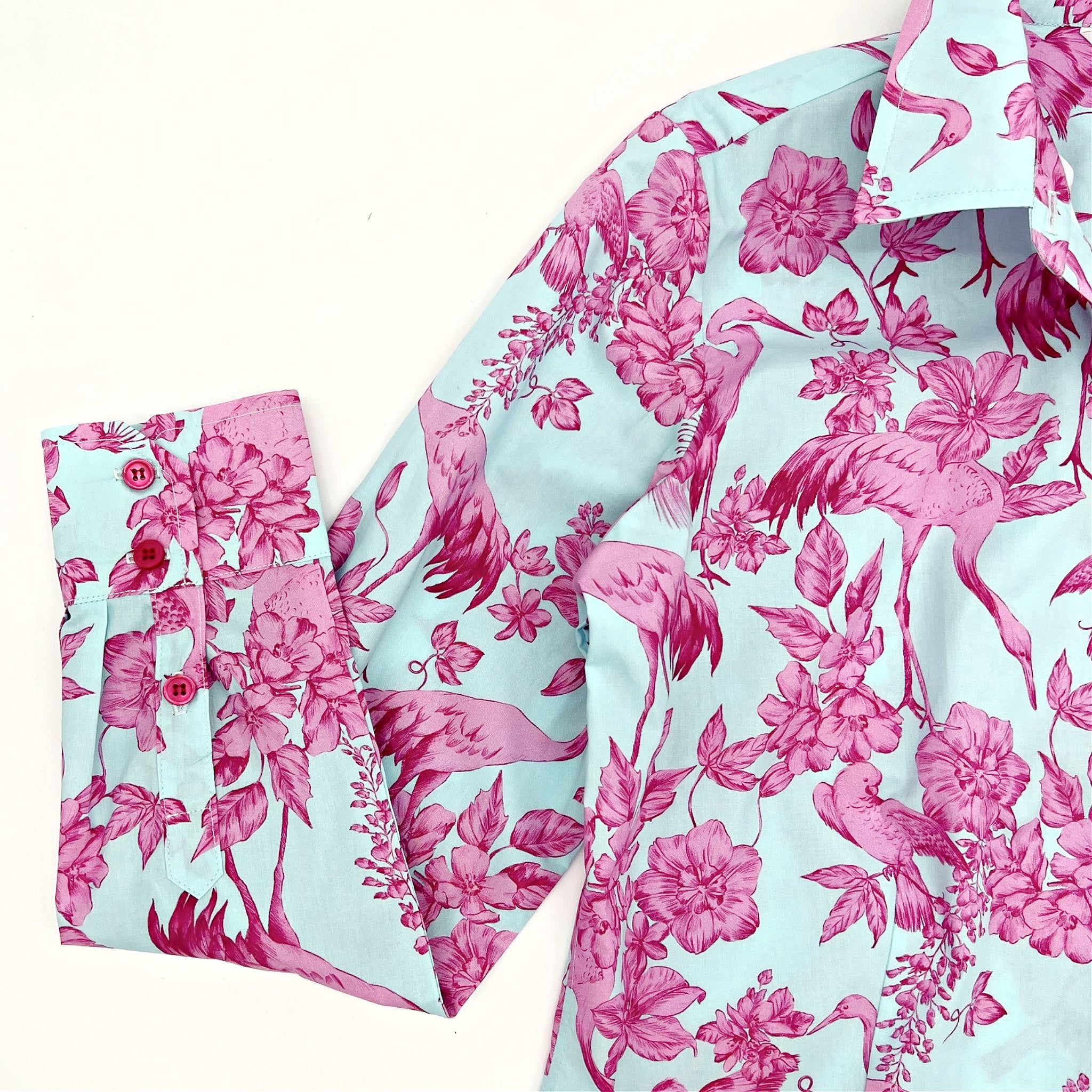 Close-up of Ladies Aviary Toile Classic Shirt sleeve and cuff with pink and blue bird print