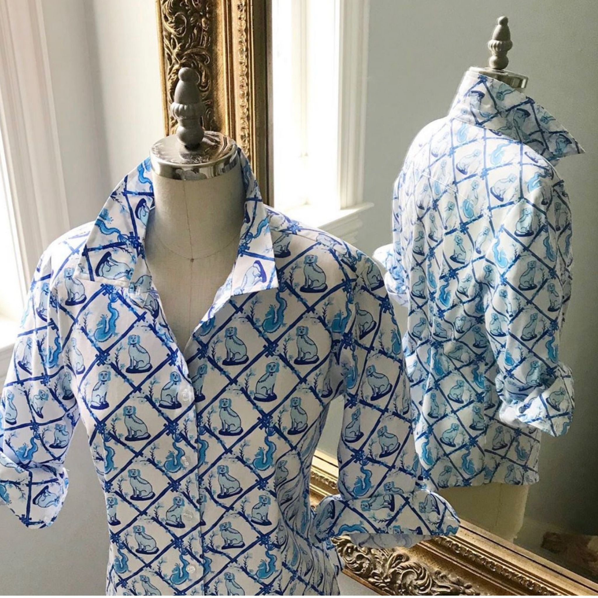 Ladies' classic button-down shirt in Willa Heart blue and white dog print on a mannequin, with a mirror reflection of the back.