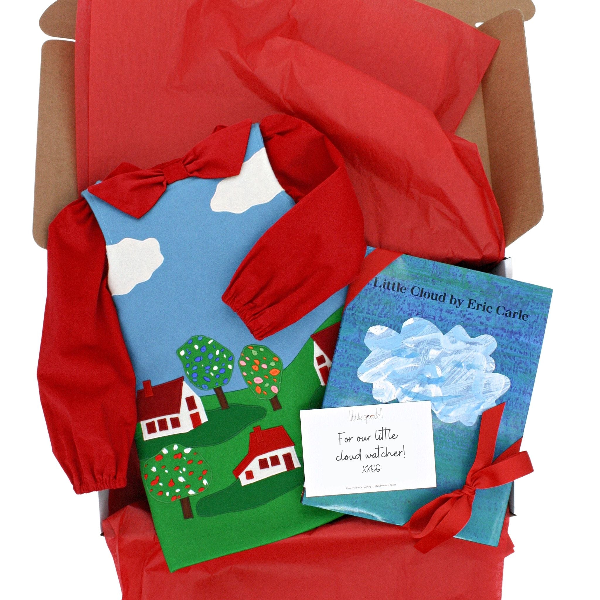 Little Cloud Gift Set with a merino wool jumper, red bow blouse, and Little Cloud hardcover book, beautifully packaged in a gift box.