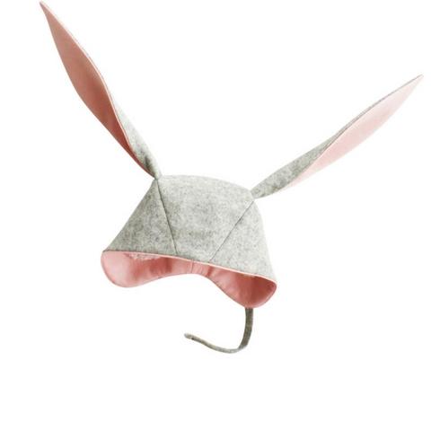 Grey bunny hat with long ears, made of Merino wool in light heather grey, featuring a chin strap and pink-lined ears.