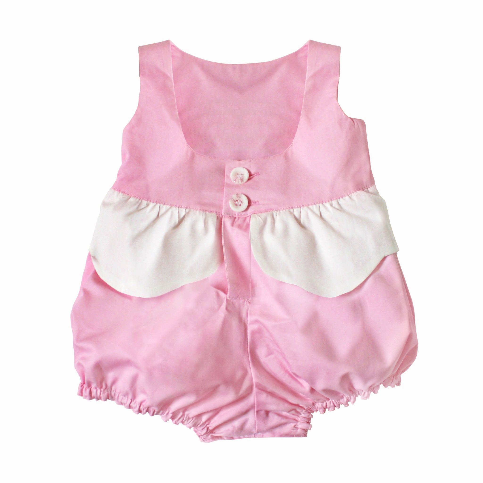 Back view of the Over the Rainbow Bubble Romper in Sunset Pink with button closure and cloud peplum detail