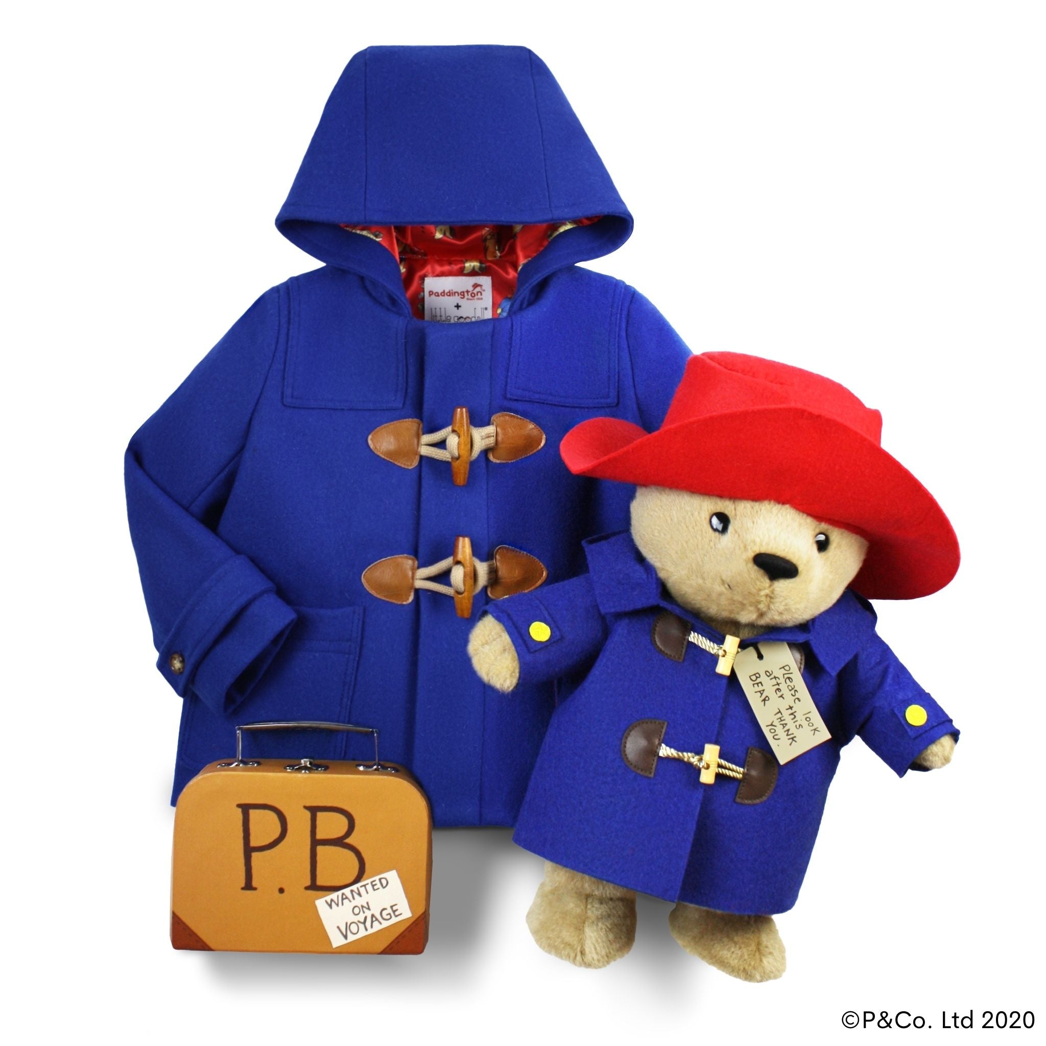 Paddington Bear Gift Set with a royal blue wool coat, 16" plush bear in a matching coat and red hat, plus a vintage-style suitcase labeled "PB