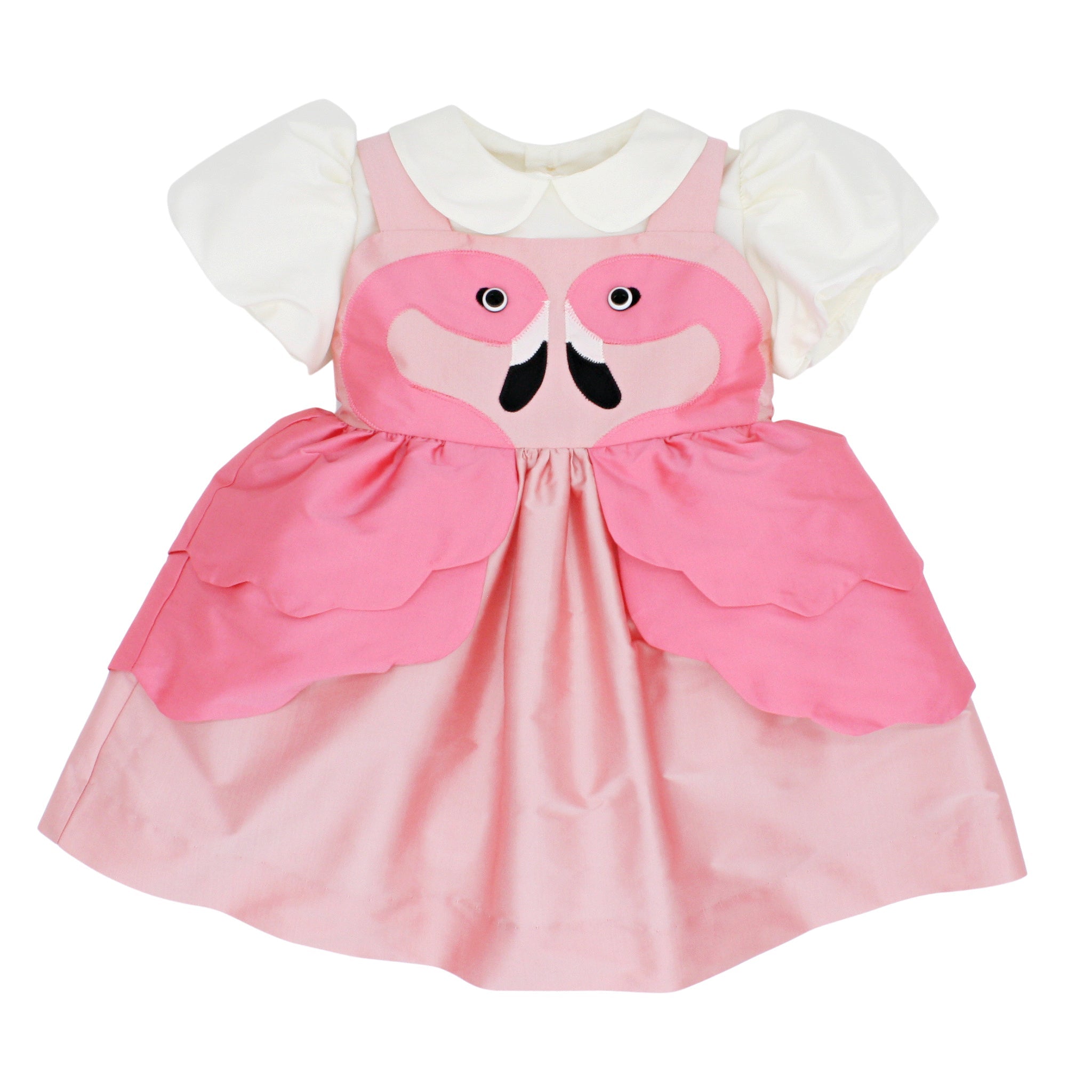 Pink flamingo dress paired with ivory puff sleeve blouse, featuring scalloped peplum and flamingo applique for summer outfit