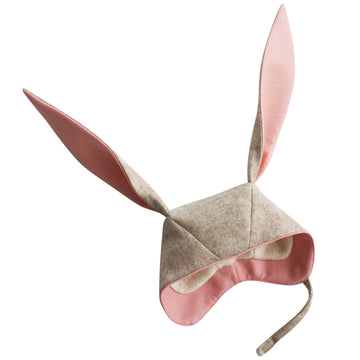  A cozy light grey bunny hat made from Merino wool with soft cuddle fleece lining and velcro chin strap.