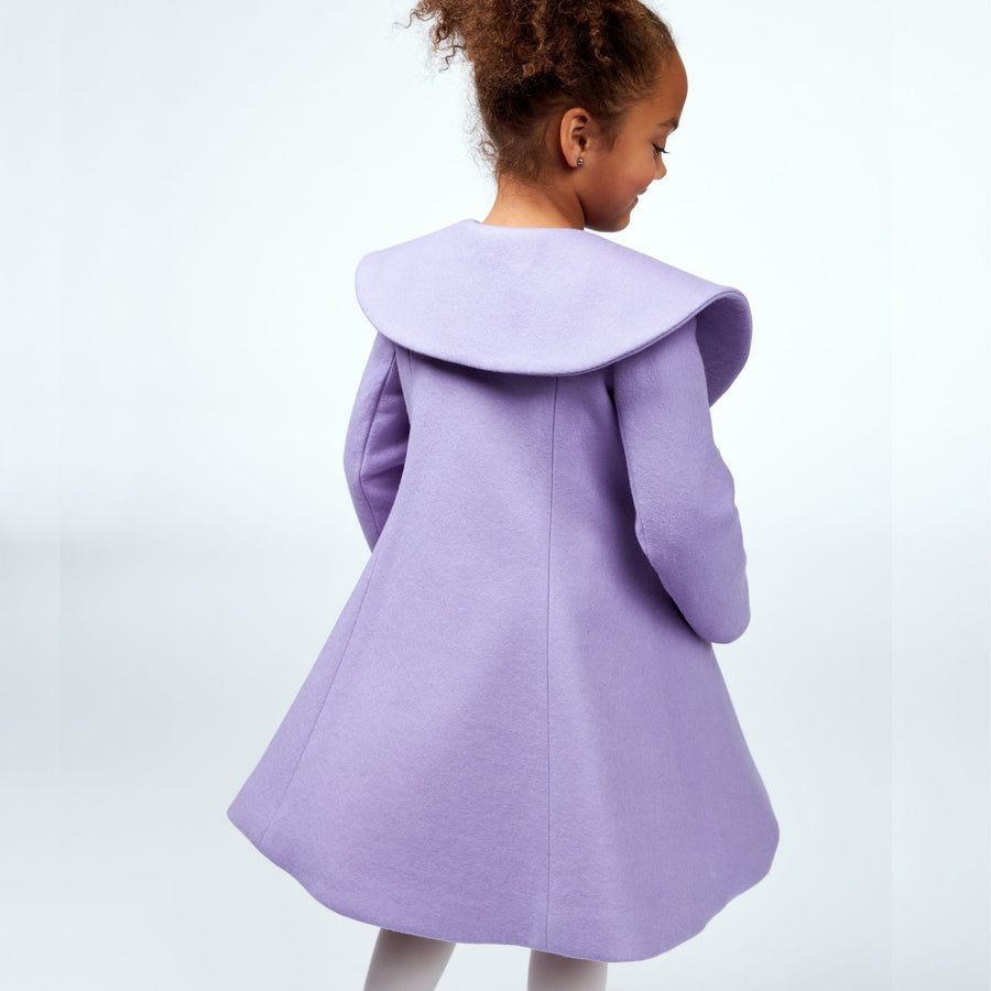 Back view of a purple girls' coat with a wide butterfly-inspired collar, flared silhouette, and soft wool fabric.